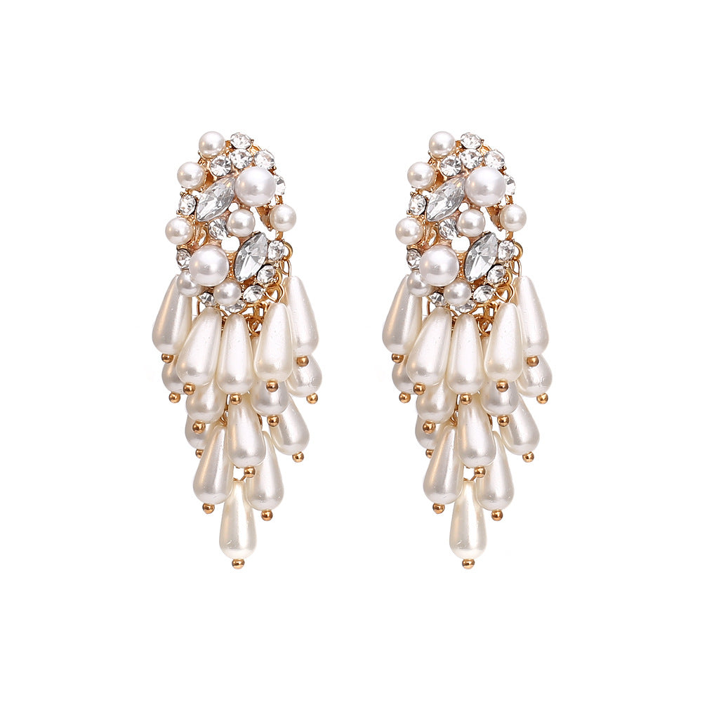 The Silent Move Dramatic Pearl Tassel Statement Earrings (Gold)